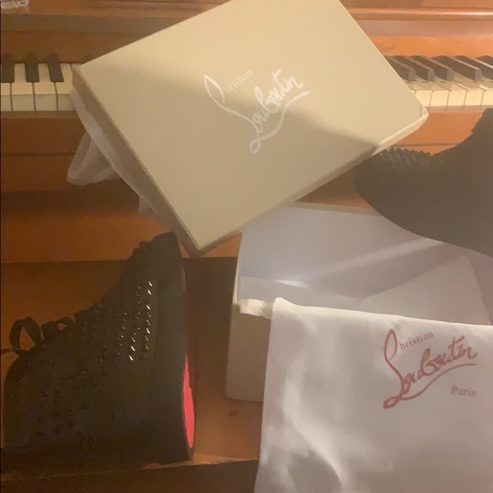 Louboutin's black calfskin high-top sneakers